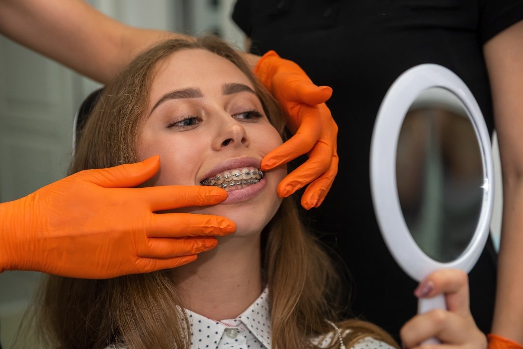 Teen looking at braces